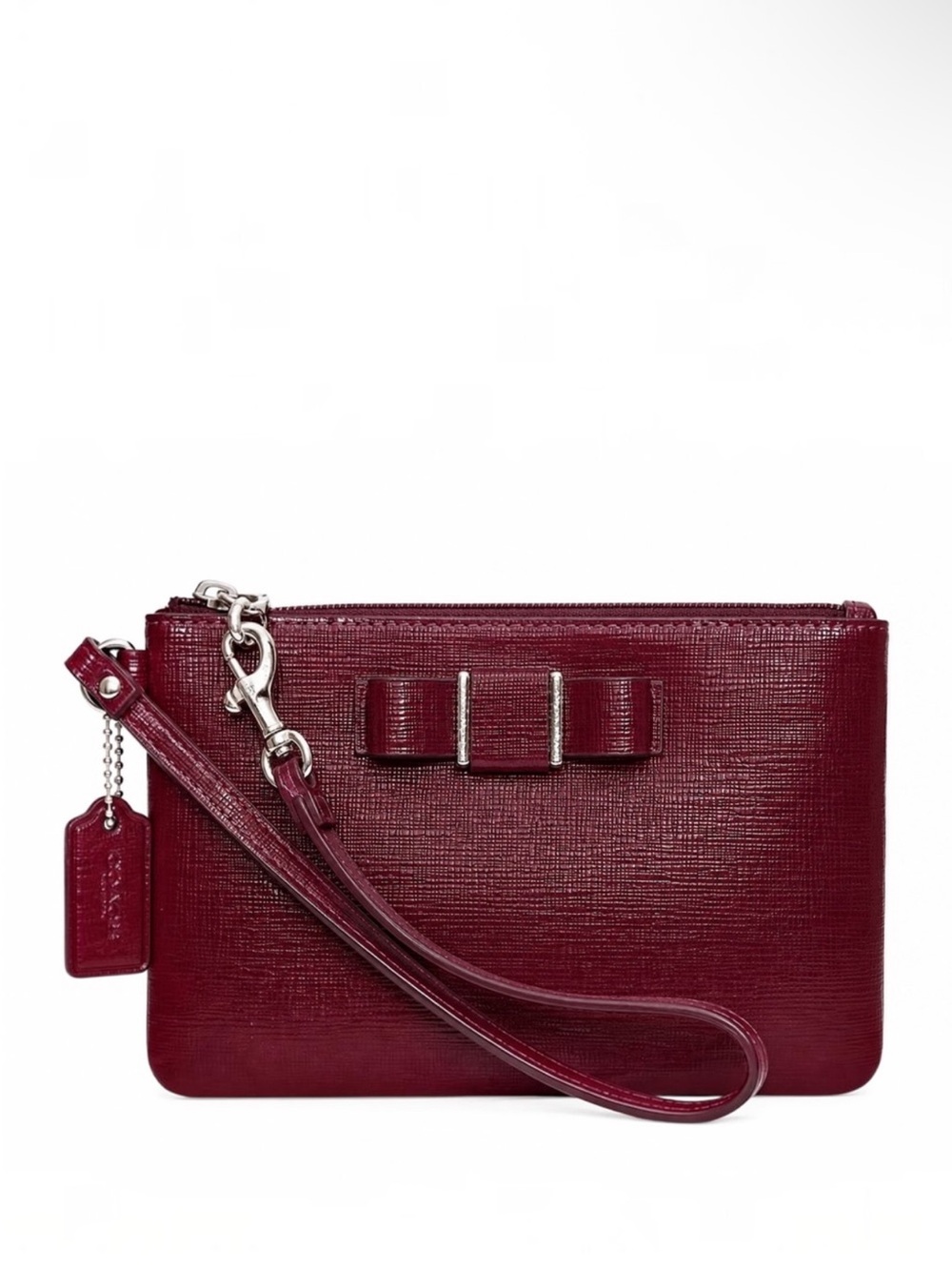 COMING SOON
Coach Darcy Patent Bow Wristlet-Like New
